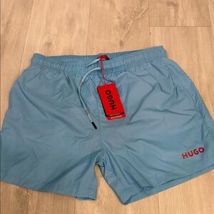 HUGO Light Blue Swim Trunks with Red Logo